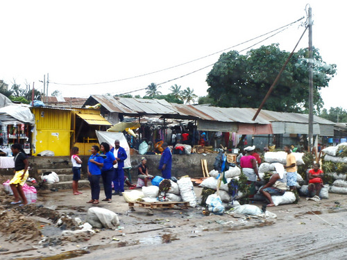 A heavy rain has wet down all of the street markets.